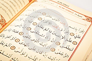 Pages verses from the holy book of islam religion quran, kuran and chapters, surah alak from the Quran photo