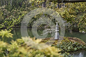 A pagoda made of stone in the park of the Golden pavilion.