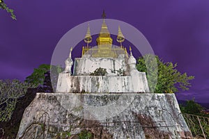 Pagoda of Phu Si Temple at twilight time in Luang Pra bang, Laos