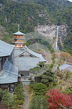 Pagoda of Seiganto-ji Temple with Nachi no Taki waterfall in background at Nachi Katsuura, Wakayama, Japan