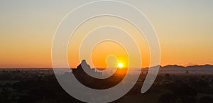 Pagoda and sunrise at Misty Bagan, Myanmar