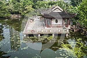 Pagoda temple pond Kowloon Park Hong Kong