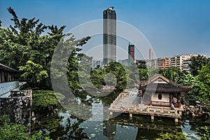 Pagoda temple pond Kowloon Walled City Park Hong Kong