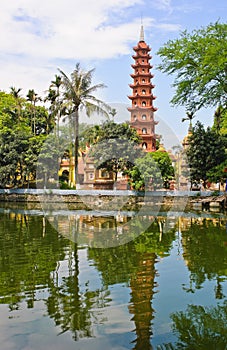 Pagoda of Tran Quoc temple with reflection photo