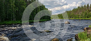 PahtajyrhÃ¤mÃ¤ river in Lapland, Finland.