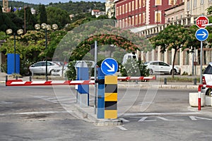 Paid parking with barriers at the entrance and exit