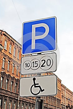Paid parking for disabled road sign