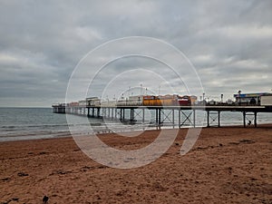 Paignton is a seaside town on the coast of Tor Bay in Devon, England.