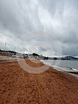 Paignton is a seaside town on the coast of Tor Bay in Devon, England.