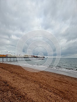 Paignton is a seaside town on the coast of Tor Bay in Devon, England.