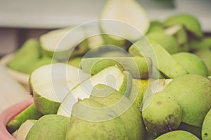 pailful of the ripe cut pears/pailful of the ripe cut pears, selective focus