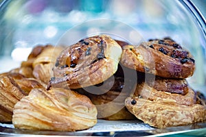 Pain aux raisins or escargot is a spiral pastry often consumed for breakfast.