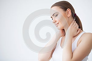 Pain. Beautiful Young Woman Feeling Sick and Has a Pain in the Neck