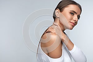 Pain In Body. Beautiful Woman Feeling Pain In Neck And Shoulders