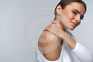 Pain In Body. Beautiful Woman Feeling Pain In Neck And Shoulders