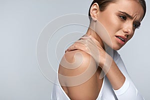 Pain In Body. Beautiful Woman Feeling Pain In Neck And Shoulders