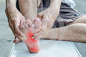 Pain in the foot. Massage of male feet.