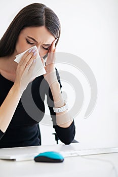 Pain. Ill Business Woman Suffering at Work Behind the Desk in He