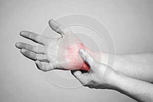 Pain in the joints of the hands. Carpal tunnel syndrome. Hand injury, feeling pain. Health care and medical concept photo