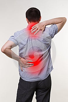 Pain in the male body, man with backache, sciatica and scoliosis, chiropractor treatment concept