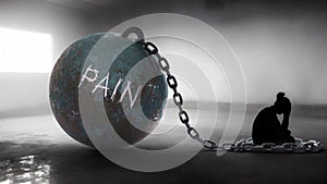 Pain - a metaphorical view of a woman struggle with pain. Trapped alone and chained to a burden of Pain. Constant and st