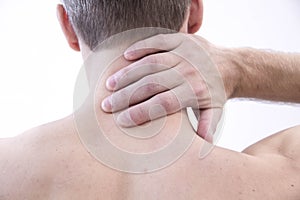 Pain in the neck. Man with backache. Muscular male body. Isolated on white background with red dot. healthcare and