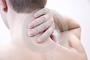 Pain in the neck. Man with backache. Muscular male body. Isolated on white background red dot. healthcare and problem