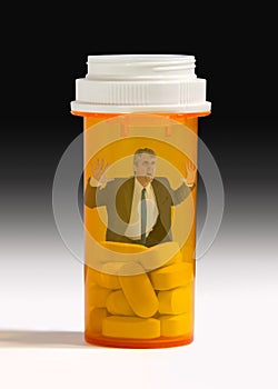 Pain pill addiction man trapped in pill bottle