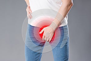 Pain in prostate, man suffering from prostatitis or from a venereal disease