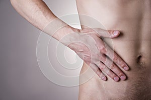 Pain in the right side. Attack of appendicitis photo