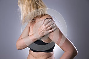 Pain in shoulder, care of female hands, ache in woman`s body