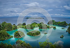 Painemo Islands, Blue Lagoon with Green Rockes, Raja Ampat, West Papua, Indonesia