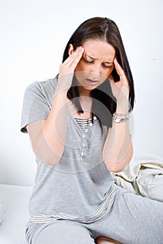 Painful head ache woman