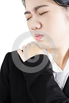 Painful shoulder in a businesswoman isolated on white background. Clipping path on white background.