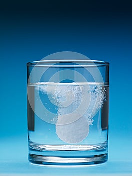 Painkiller dissolving in water