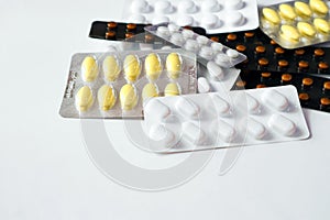 Painkiller tablets, pills and capsules medicine using for treatment and cure the disease or sickness. Drug prescription.