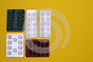 painkillers, antibiotics, vitamins and tablets in a blister pack. layout. mock up