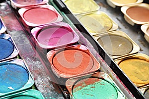 Paint box with splatters; unleashed colors photo