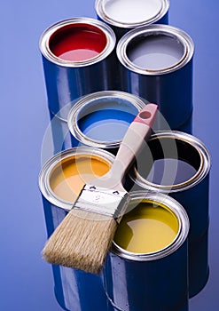 Paint brush and cans