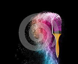 paint brushes with abstract powder color explosion isolated on b photo