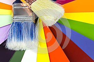 Paint Brushes With Color Cards. Color swatches and brushes on white background