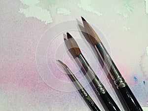 Paint Brushes over Water Color