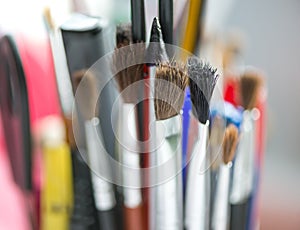 Paint brushes. Painting materials. Concept of artistic, art education and creativity. Selective focus. Copy space.