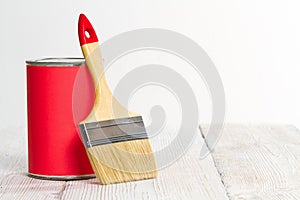 Paint Can Brush, Lacquer Wood Floor, White Wall photo