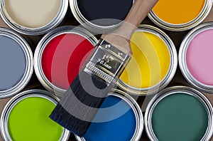 Paint - Cans of colorful emulsion paint