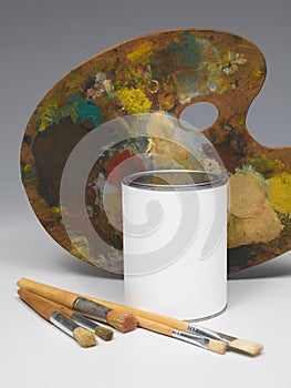 Paint pot and paintbrushes