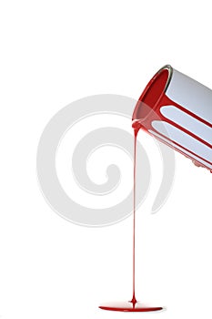 Paint pouring out of can isolated on white