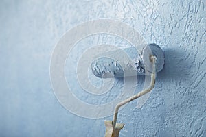 Paint roller colour wall texture in blue