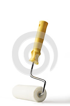 Paint roller with yellow handle on white background