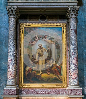 Paint with Saint Benedict Joseph Labre, in the Church of Santa Maria ai Monti, in Rome, Italy. photo